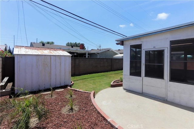 11618 Cedarvale St, Norwalk, CA 90650 - view of yard featuring a patio area, an outdoor structure, and a storage unit