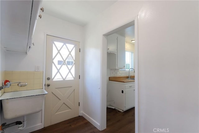 11618 Cedarvale St, Norwalk, CA 90650 - doorway featuring dark wood-type flooring and a sink
