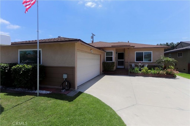 11618 Cedarvale St, Norwalk, CA 90650 - ranch-style house with a garage, driveway, stucco siding, and a front yard