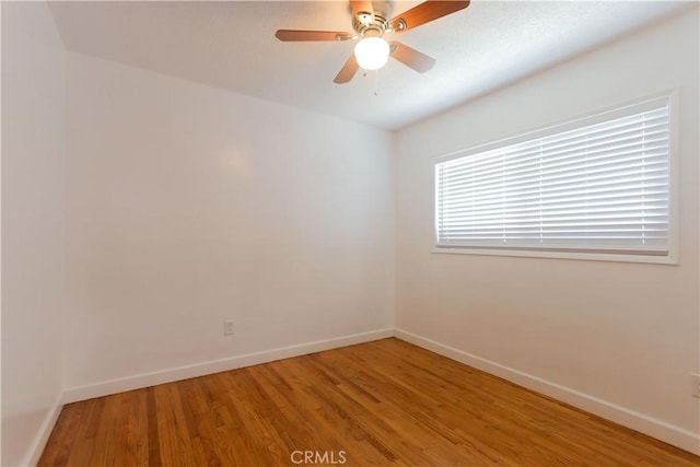 11618 Cedarvale St, Norwalk, CA 90650 - empty room with baseboards, light wood-style floors, and a ceiling fan