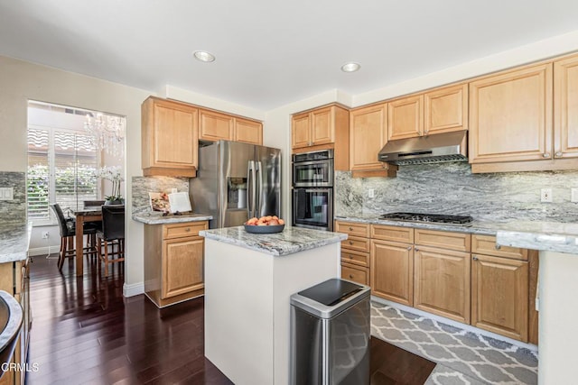 kitchen featuring stainless steel appliances, under cabinet range hood, dark wood-style floors, backsplash, and recessed lighting
