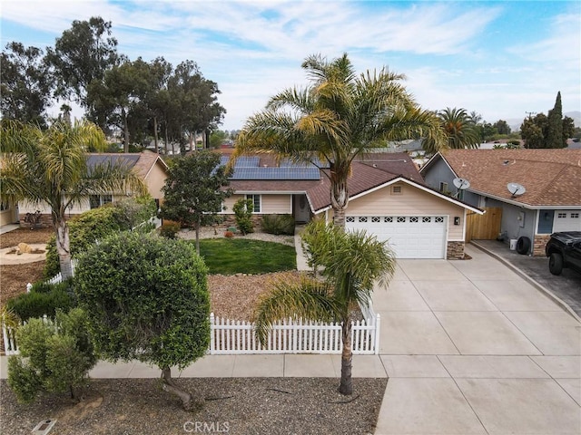 448 Grove Ln, Nipomo, CA 93444 - single story home featuring an attached garage, concrete driveway, fence, and stone siding