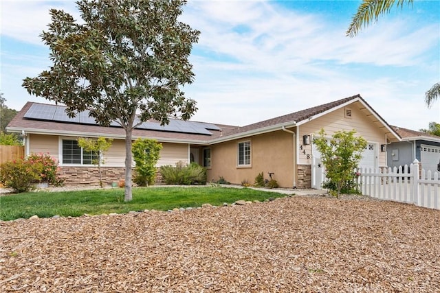 448 Grove Ln, Nipomo, CA 93444 - ranch-style house with a garage, stone siding, roof mounted solar panels, and stucco siding