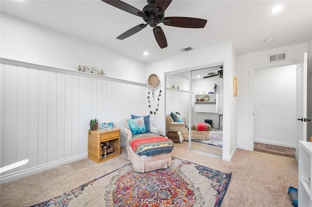 sitting room with a ceiling fan, carpet floors, recessed lighting, and baseboards