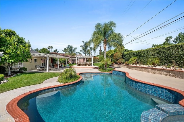 swimming pool featuring a pergola, a patio, and a yard