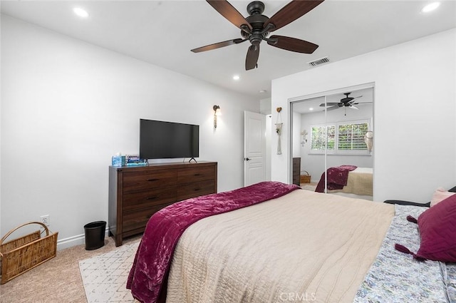 carpeted bedroom with recessed lighting, a ceiling fan, a closet, and baseboards