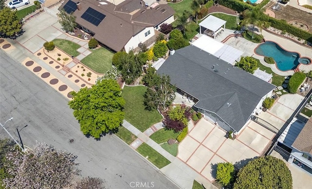 aerial perspective of suburban area with a pool area