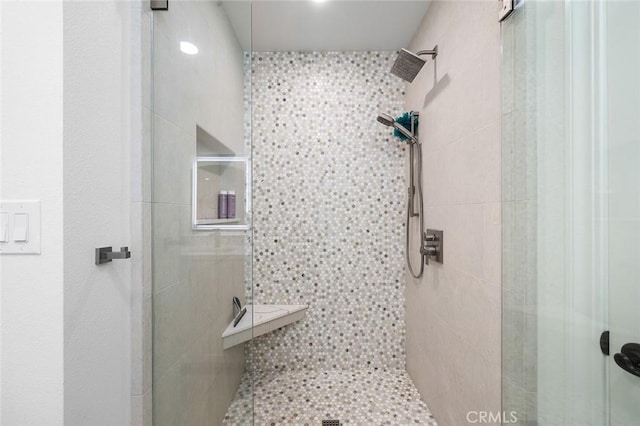 bathroom with a stall shower