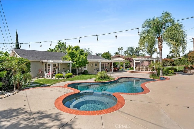 view of pool featuring a pergola, a patio area, and a pool with connected hot tub