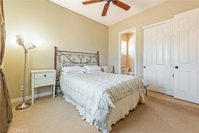 7940 Choi Dr, Riverside, CA 92506 - carpeted bedroom with ensuite bath, a ceiling fan, and baseboards