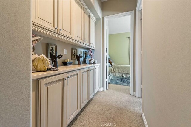 7940 Choi Dr, Riverside, CA 92506 - hall featuring light carpet and a textured wall