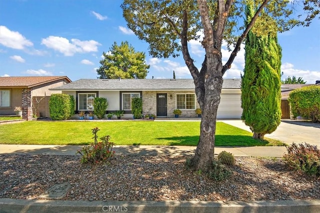 ranch-style home with a front yard, stucco siding, and driveway