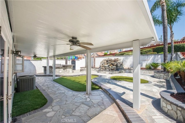 view of patio with a ceiling fan, central AC, and a fenced backyard