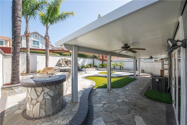 9788 Balaton St, Rancho Cucamonga, CA 91737 - fenced backyard with a ceiling fan, area for grilling, a patio area, and a water view