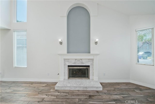 9788 Balaton St, Rancho Cucamonga, CA 91737 - unfurnished living room featuring wood finished floors and a fireplace