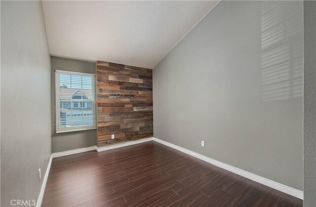 9788 Balaton St, Rancho Cucamonga, CA 91737 - empty room with dark wood finished floors and wood walls