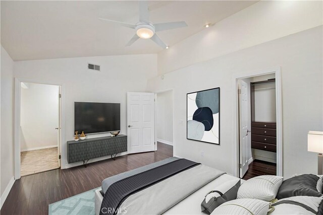 9788 Balaton St, Rancho Cucamonga, CA 91737 - bedroom featuring vaulted ceiling, dark wood finished floors, a spacious closet, and ceiling fan