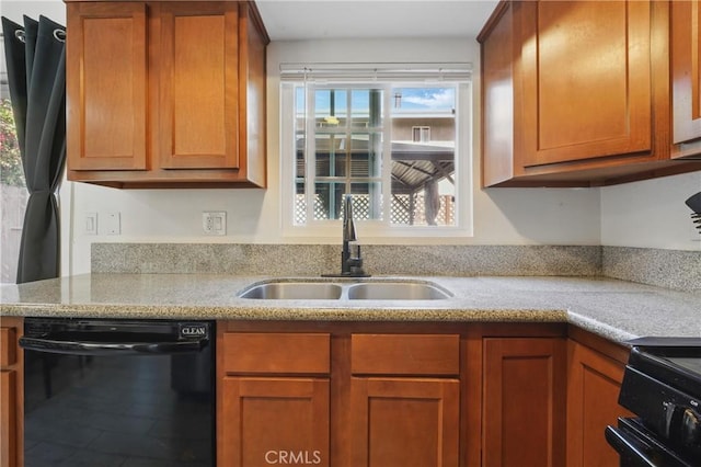 13722 Cerise Ave, Hawthorne, CA 90250 - kitchen with black appliances, a sink, brown cabinets, and light stone counters