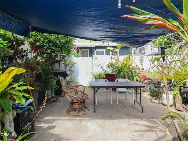 1035 Ohio Ave, Long Beach, CA 90804 - view of patio / terrace featuring outdoor dining space and fence