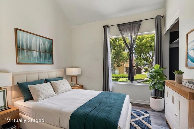 514 Jamacha Rd Unit 17, El Cajon, CA 92019 - bedroom featuring vaulted ceiling, wood finished floors, and baseboards