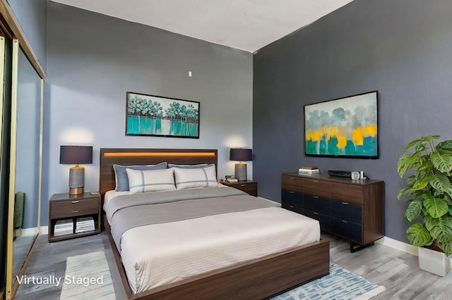 514 Jamacha Rd Unit 17, El Cajon, CA 92019 - bedroom with light wood finished floors and baseboards