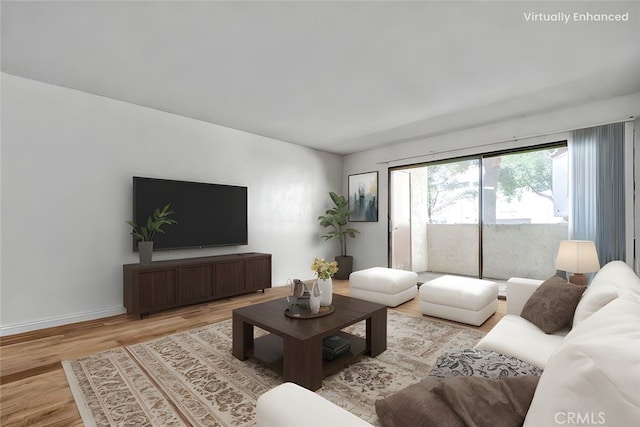 600 W 3rd St Unit A115, Santa Ana, CA 92701 - living area featuring wood finished floors and baseboards
