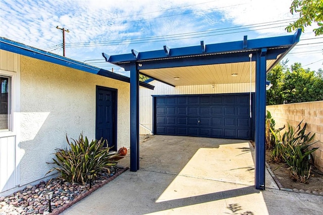 garage featuring fence