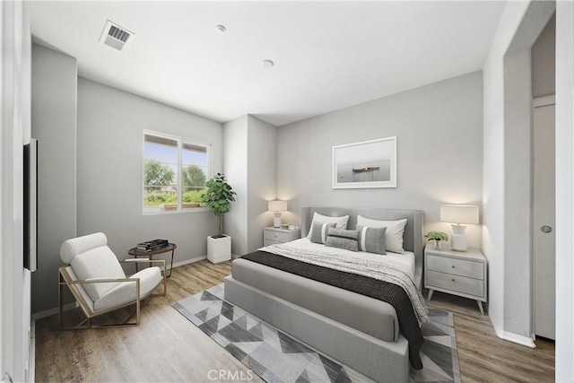 986 Coriander Dr Unit 304, Hemet, CA 92545 - bedroom featuring wood finished floors and baseboards