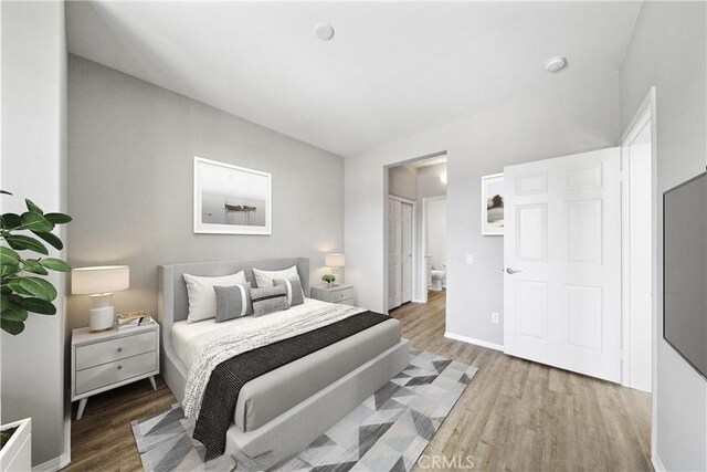 986 Coriander Dr Unit 304, Hemet, CA 92545 - bedroom with wood finished floors and baseboards