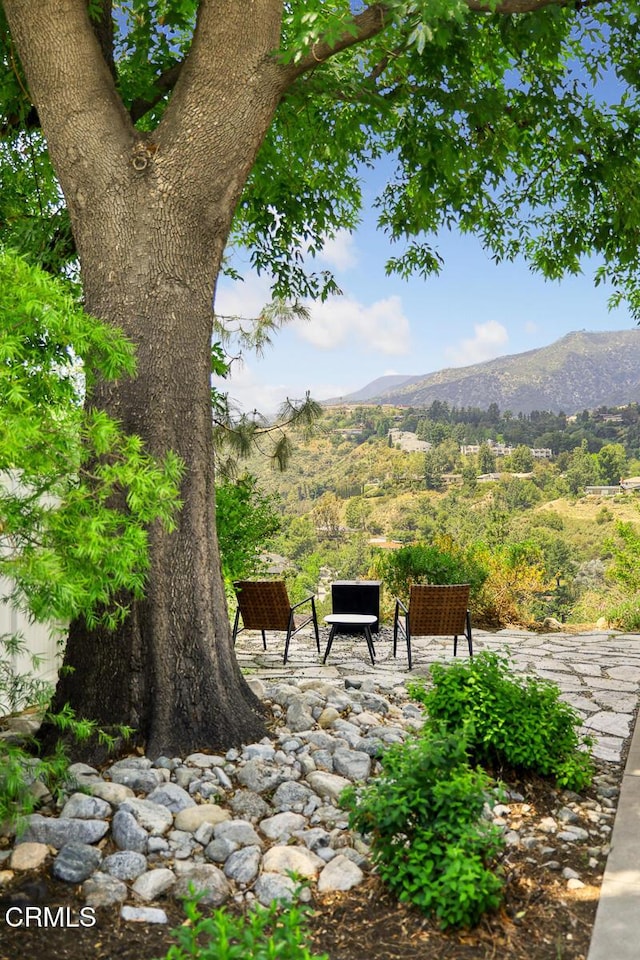 view of patio with a mountain view