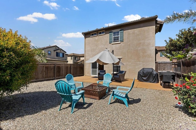 2024 Green Ridge Cir, Lompoc, CA 93436 - fenced backyard featuring an outdoor fire pit and a patio