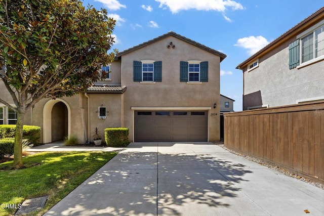 2024 Green Ridge Cir, Lompoc, CA 93436 - view of front of property featuring stucco siding, concrete driveway, a garage, and a tile roof