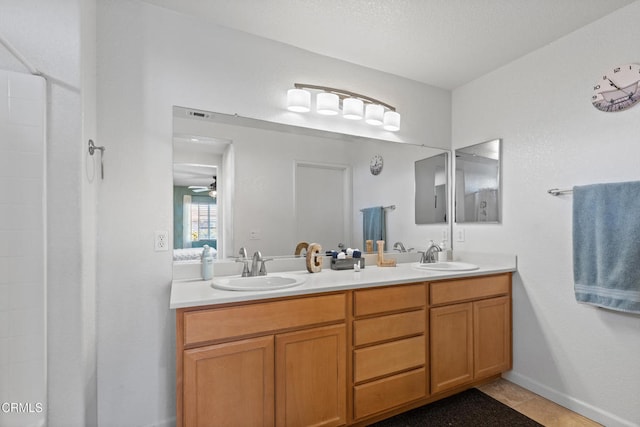2024 Green Ridge Cir, Lompoc, CA 93436 - full bathroom with double vanity and baseboards