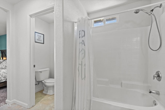 2024 Green Ridge Cir, Lompoc, CA 93436 - bathroom featuring shower / bath combo, toilet, baseboards, and connected bathroom