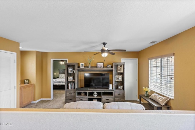 2024 Green Ridge Cir, Lompoc, CA 93436 - living room with ceiling fan, carpet floors, and baseboards