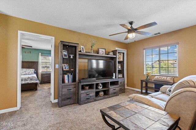 2024 Green Ridge Cir, Lompoc, CA 93436 - living room featuring ceiling fan and carpet floors