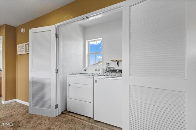 2024 Green Ridge Cir, Lompoc, CA 93436 - washroom with washer and dryer and light carpet