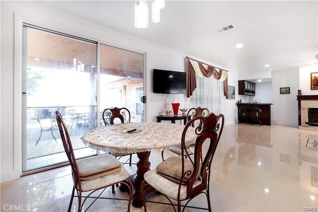 22329 Plummer St, Chatsworth, CA 91311 - dining area with crown molding and a fireplace