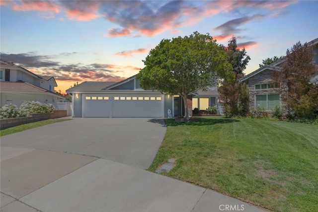 30872 Kiowa River Ct, Temecula, CA 92591 - view of front of house with a garage, concrete driveway, and a yard