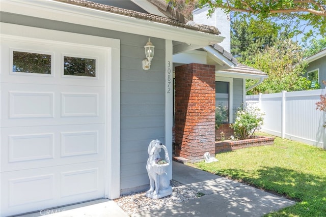 30872 Kiowa River Ct, Temecula, CA 92591 - view of exterior entry featuring fence and an attached garage