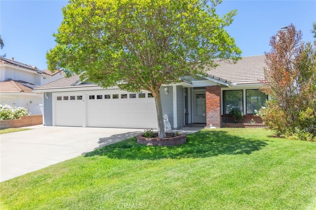 30872 Kiowa River Ct, Temecula, CA 92591 - view of front facade featuring concrete driveway, an attached garage, a front yard, and a tiled roof