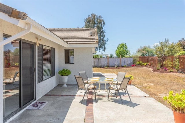 30872 Kiowa River Ct, Temecula, CA 92591 - view of patio / terrace featuring a fenced backyard and outdoor dining space