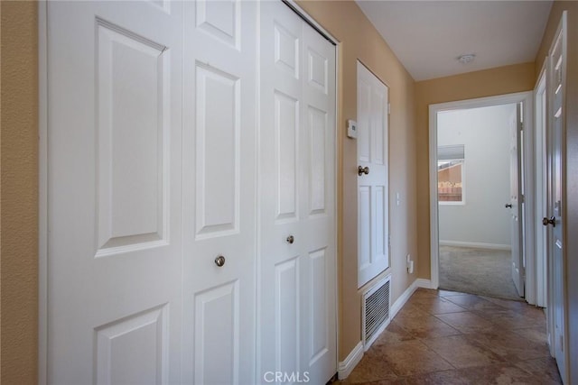 6649 Pine Spring Ave Unit 29, Palms, CA 92277 - hallway featuring baseboards and carpet flooring