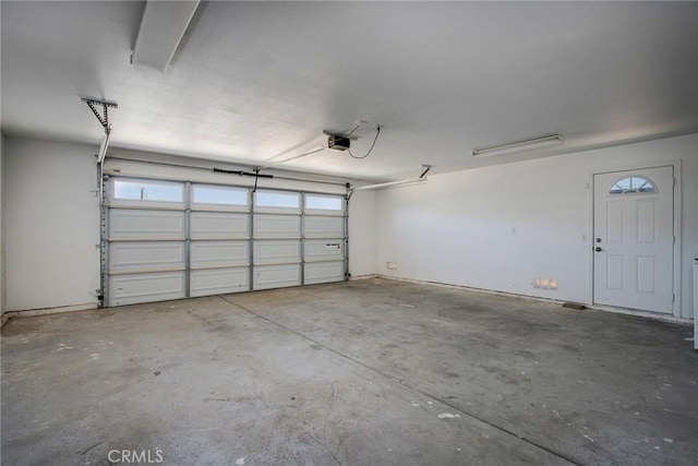 6649 Pine Spring Ave Unit 29, Palms, CA 92277 - garage with a garage door opener