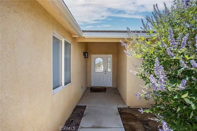 6649 Pine Spring Ave Unit 29, Palms, CA 92277 - doorway to property featuring stucco siding