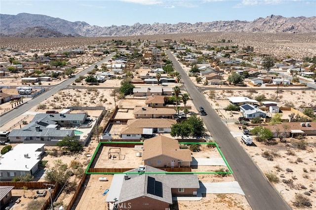 6649 Pine Spring Ave Unit 29, Palms, CA 92277 - aerial perspective of suburban area featuring property boundaries highlighted and a mountainous background
