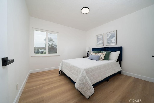 13282-13280 Nevada St, Westminster, CA 92683 - bedroom featuring light wood-type flooring and baseboards