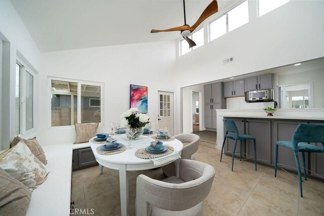 13282-13280 Nevada St, Westminster, CA 92683 - dining room featuring high vaulted ceiling and light tile patterned floors