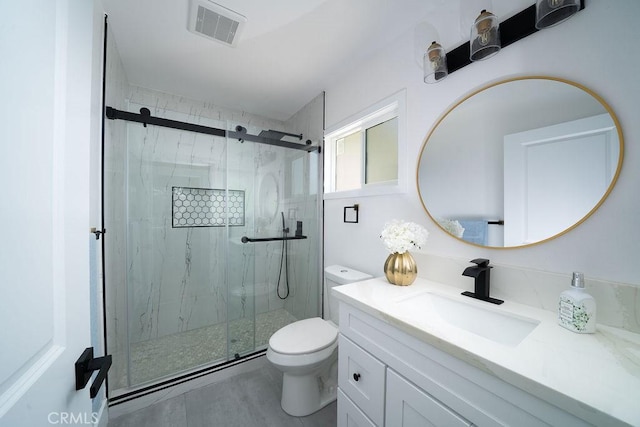 13282-13280 Nevada St, Westminster, CA 92683 - bathroom featuring toilet, vanity, and a marble finish shower