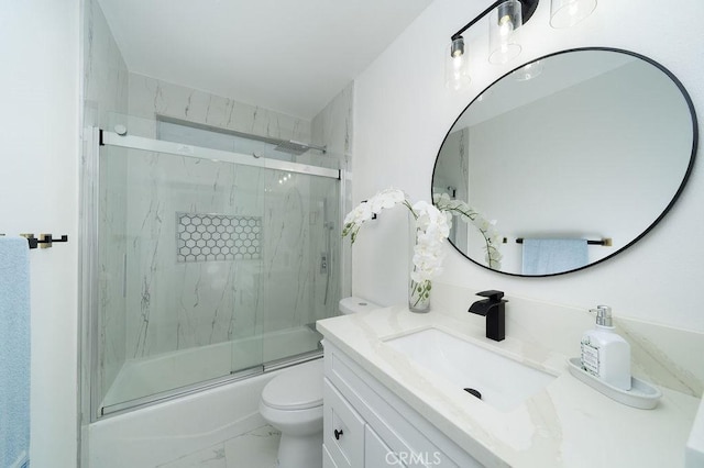13282-13280 Nevada St, Westminster, CA 92683 - bathroom with toilet, marble finish floors, vanity, and shower / bath combination with glass door